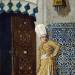 A eunuch before the door of the harem